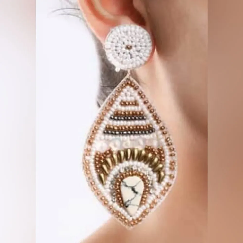 White Seed Beaded Fish Eyed Earrings in Goldtone